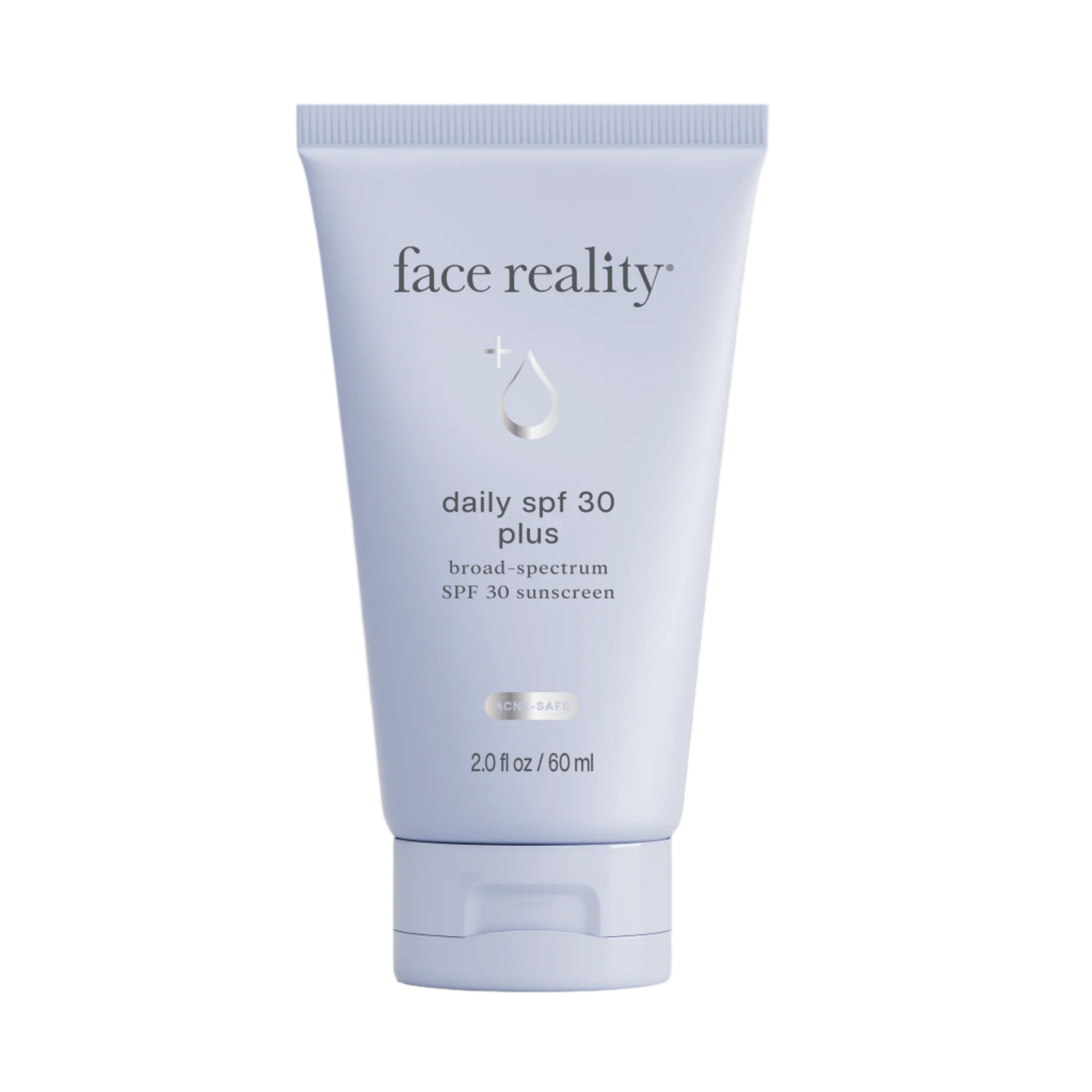 Tube of 'face reality' daily SPF 30 plus sunscreen on a gray background